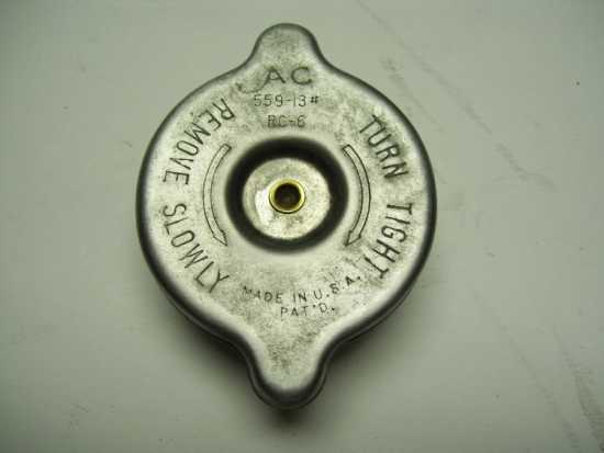 58-59 #13  F.I. radiator cap #3852236  Gr.1.203