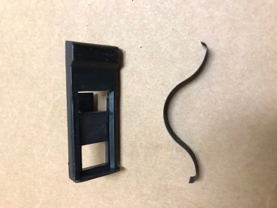 1984-89 center console door release button spring